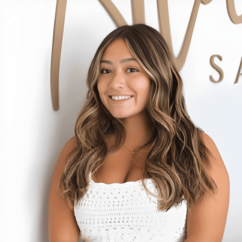 Portrait of Josalyn Escalera, a professional stylist at Alana Kai Salon, showcasing their expertise and style.