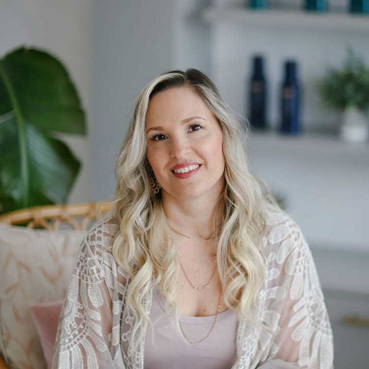 Portrait of Christina West, a professional stylist at Alana Kai Salon, showcasing their expertise and style.