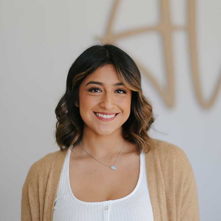 Portrait of Marlene Ocampo, a professional stylist at Alana Kai Salon, showcasing their expertise and style.