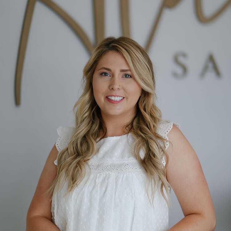 Portrait of Gabby Stanfield, a professional stylist at Alana Kai Salon, showcasing their expertise and style.