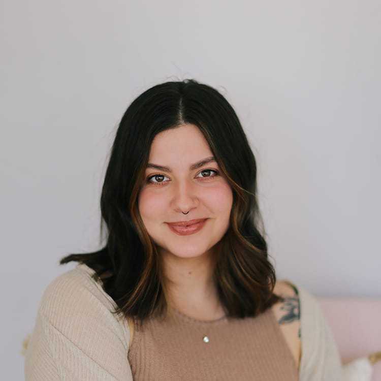 Portrait of Alex Hall, a professional stylist at Alana Kai Salon, showcasing their expertise and style.